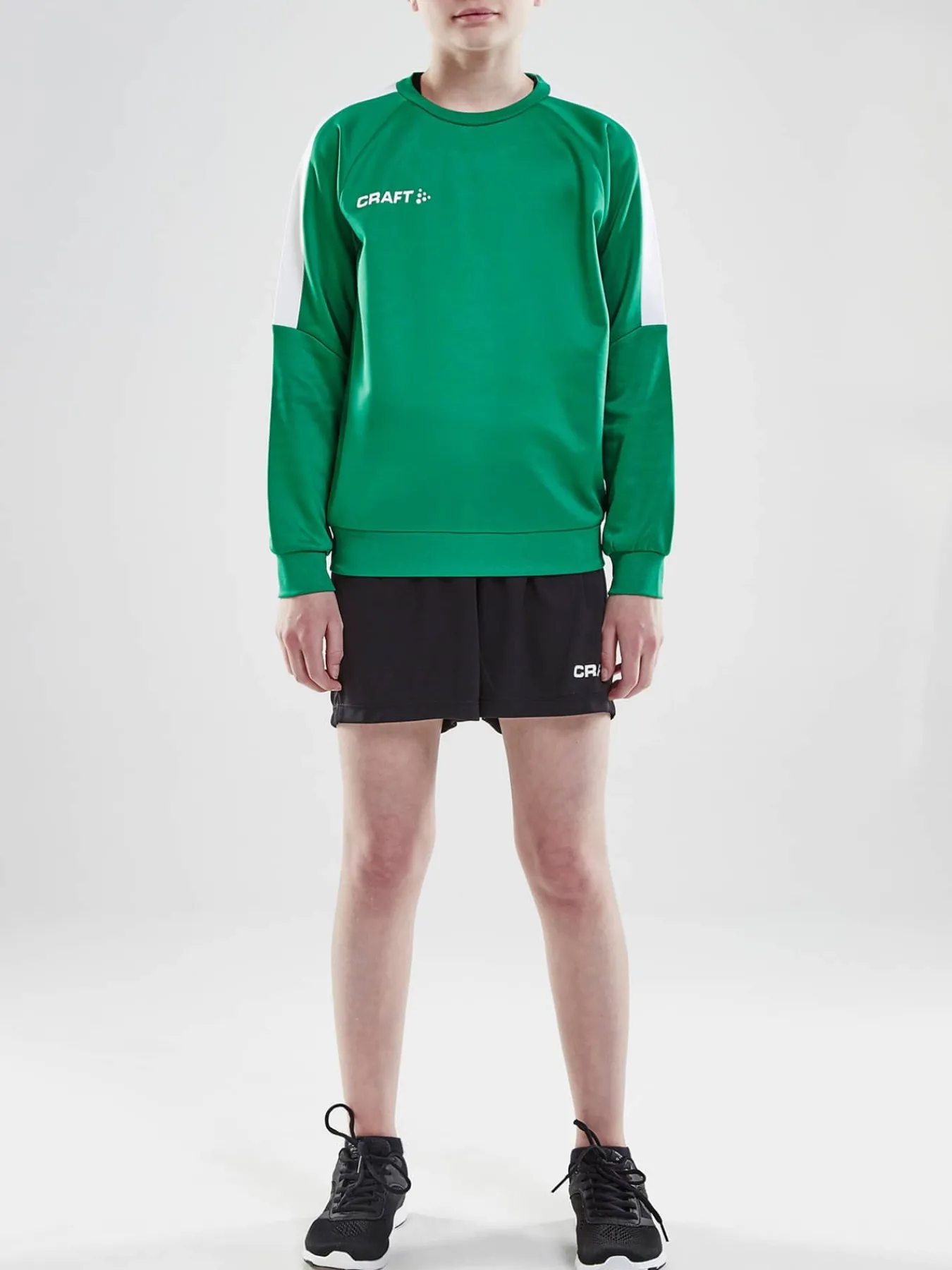 Craft Sportswear Sweatshirts & Hoodies^Progress R-Neck Sweater Jr Team Green/White