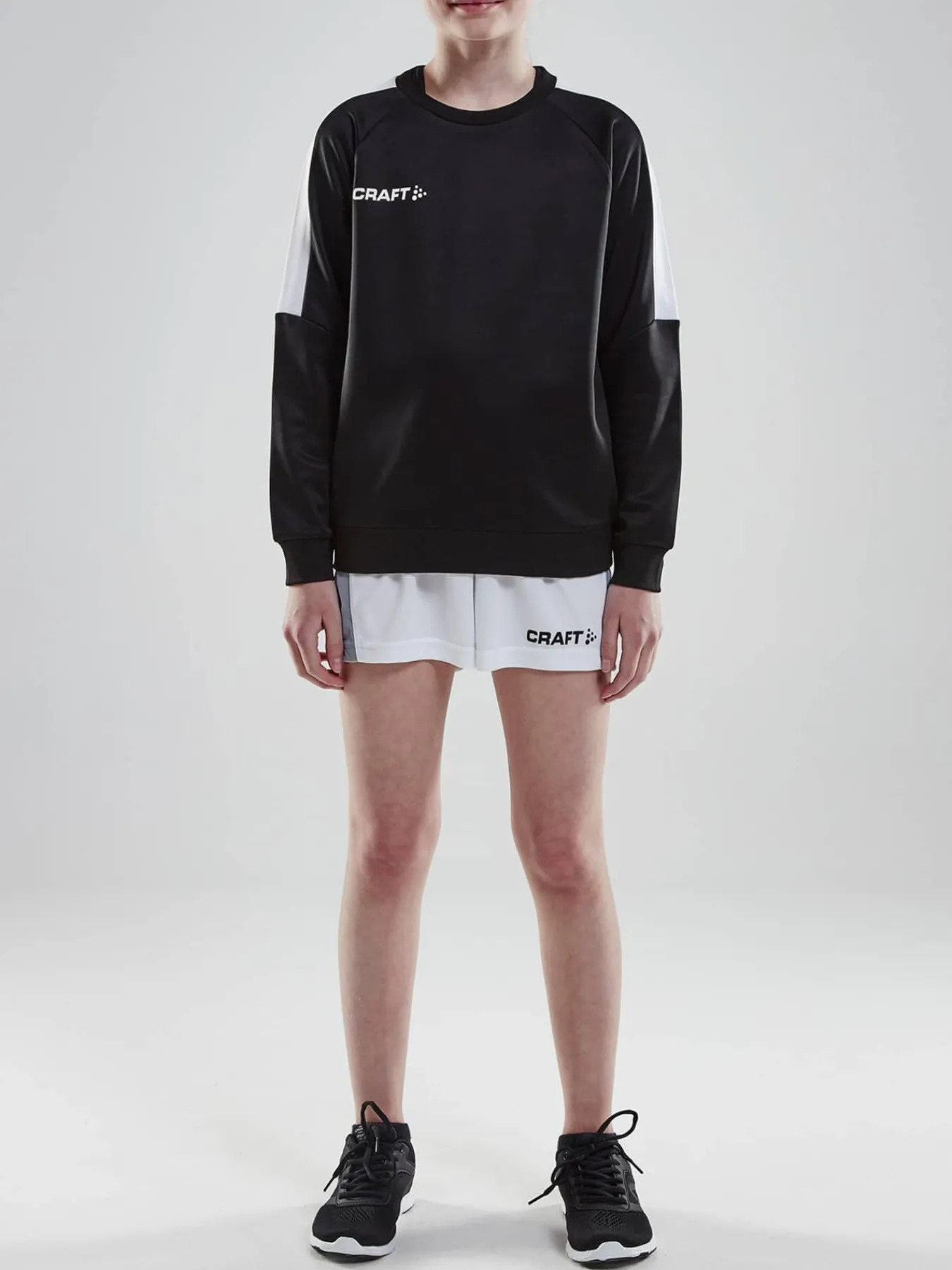 Craft Sportswear Sweatshirts & Hoodies^Progress R-Neck Sweater Jr Black/White